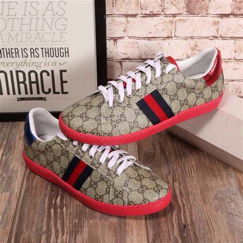 Gucci red web sneakers